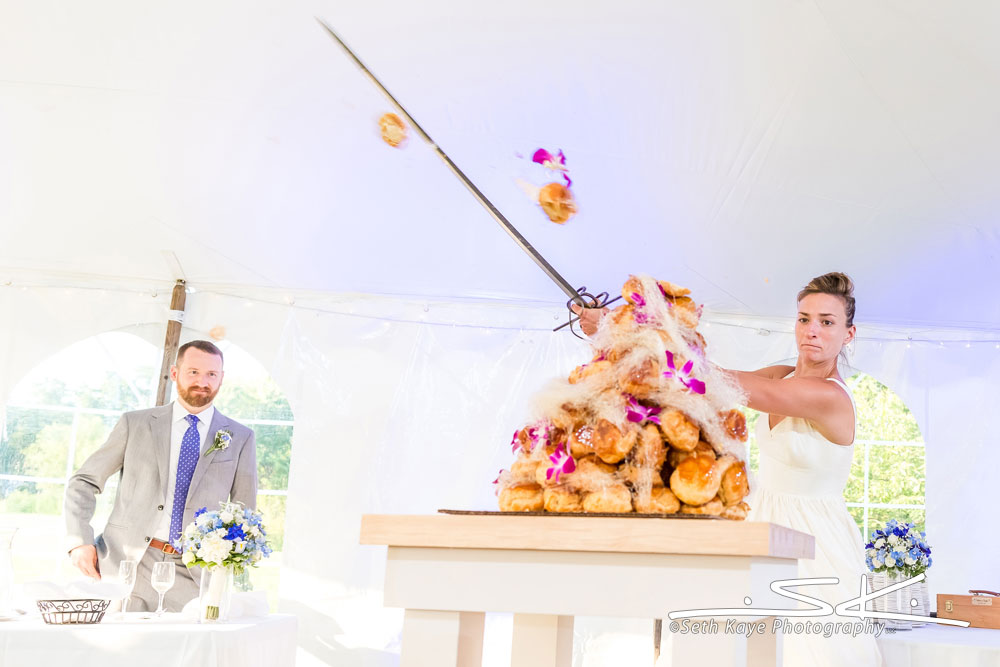 cutting croquembouche with a sword
