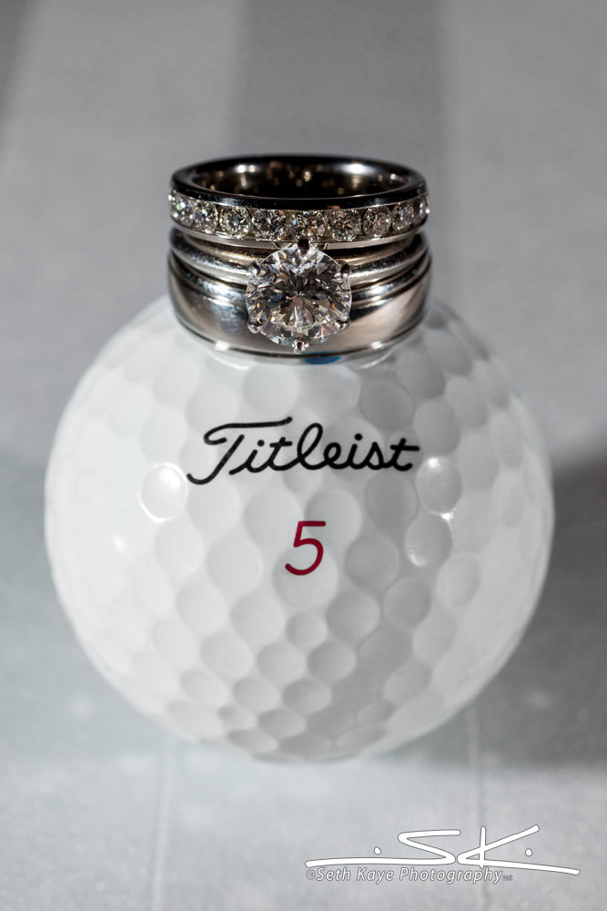 golf ball and wedding rings
