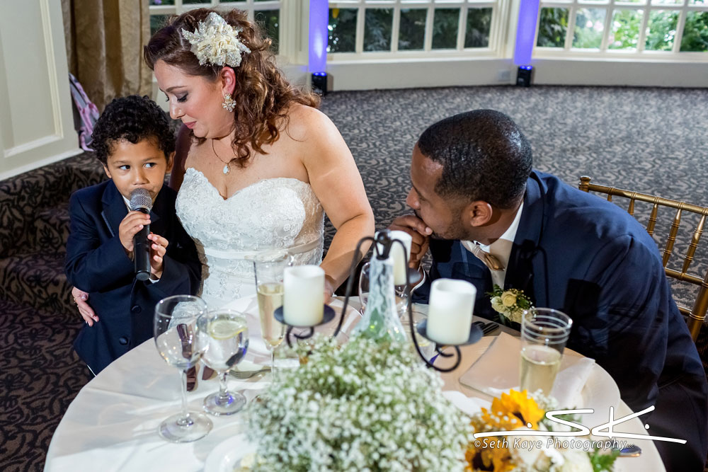 ringbearer takes the microphone
