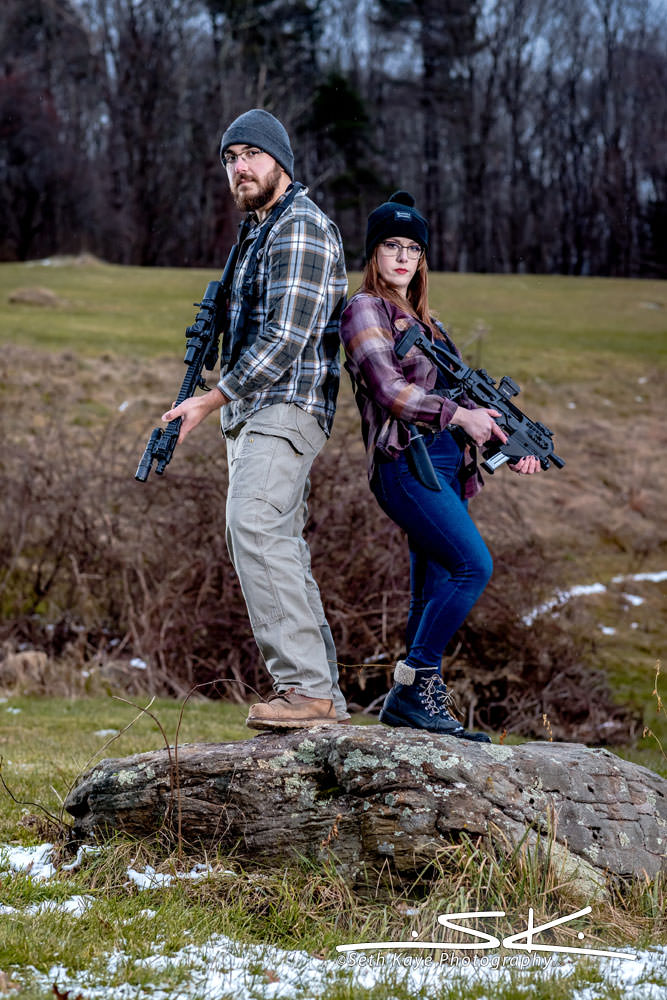engagement session portrait with firearms